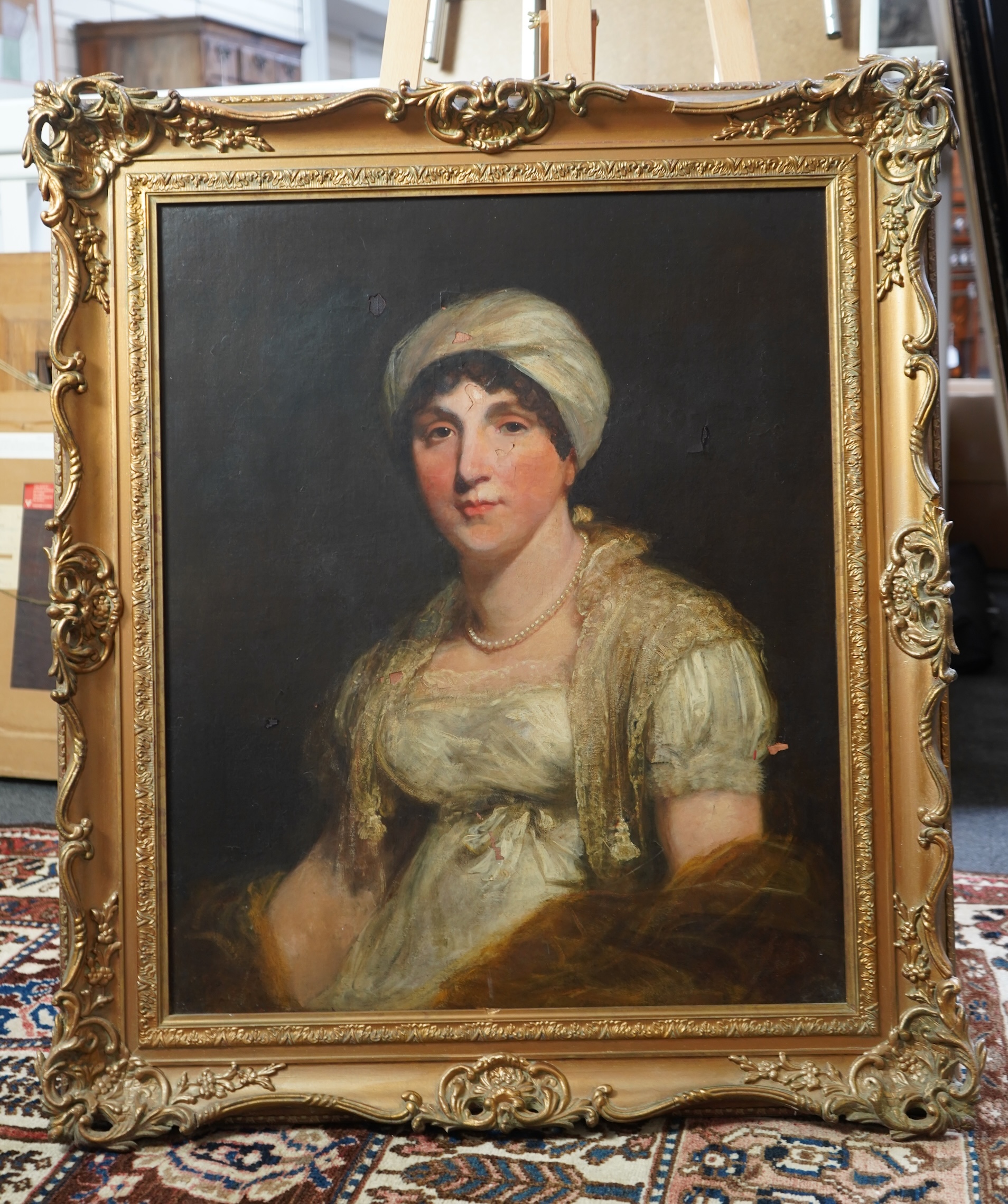 Attributed to William Boxall, 1800-1879, A portrait of a lady wearing a turban and lace shawl